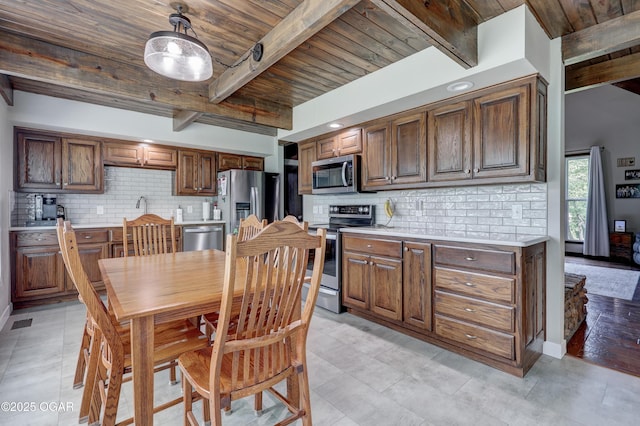 204 Split Rail Dr, Joplin, MO 64801 - dining area with a wooden ceiling with exposed beams