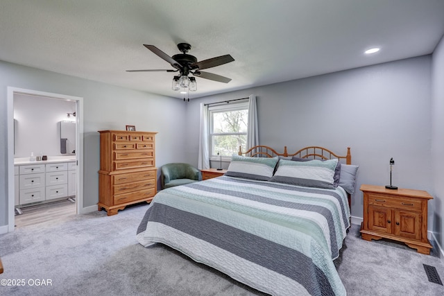 204 Split Rail Dr, Joplin, MO 64801 - bedroom with light carpet, ensuite bath, a ceiling fan, and recessed lighting