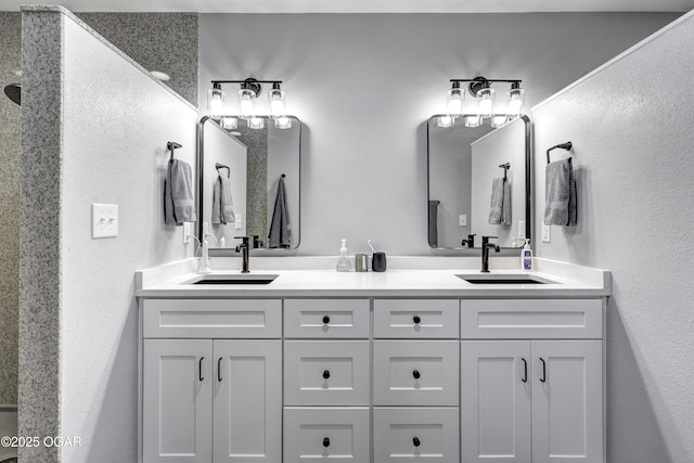 204 Split Rail Dr, Joplin, MO 64801 - full bath with double vanity and a textured wall