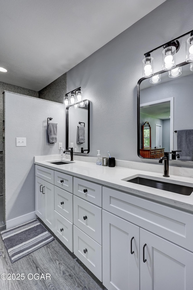204 Split Rail Dr, Joplin, MO 64801 - full bath with double vanity, a shower, and wood finished floors