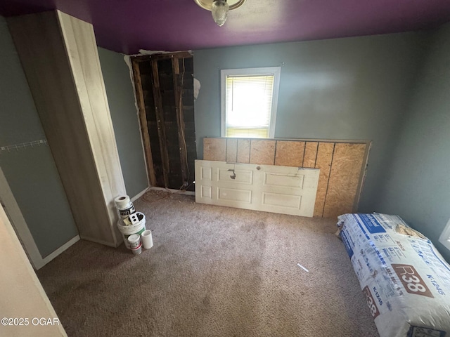 416 E 4th St, Baxter Springs, KS 66713 - unfurnished bedroom with carpet flooring and baseboards