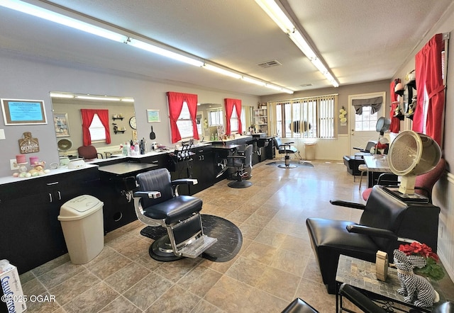 310 W 19th St, Baxter Springs, KS 66713 - miscellaneous room with a textured ceiling