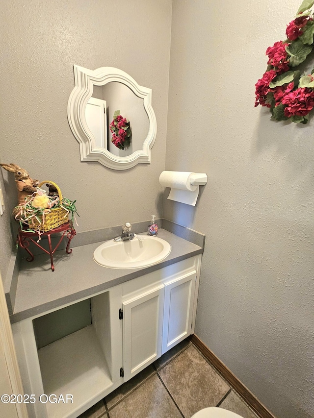 310 W 19th St, Baxter Springs, KS 66713 - bathroom featuring vanity and tile patterned floors