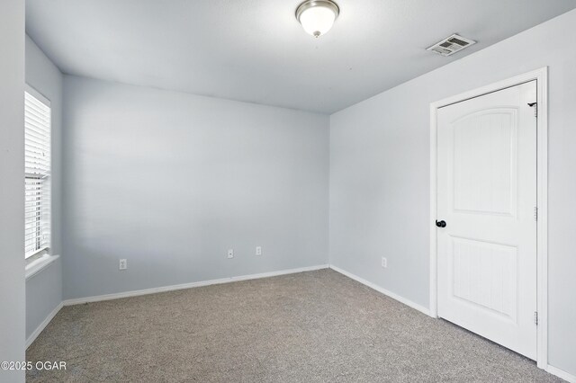 305 Anita Dr, Carl Junction, MO 64834 - carpeted empty room featuring baseboards