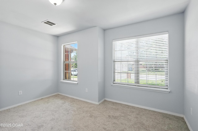 305 Anita Dr, Carl Junction, MO 64834 - carpeted empty room with plenty of natural light