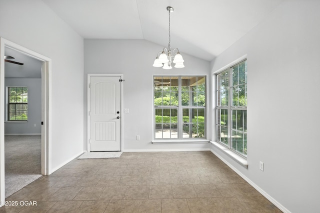 305 Anita Dr, Carl Junction, MO 64834 - unfurnished dining area with a chandelier, vaulted ceiling, and tile patterned flooring