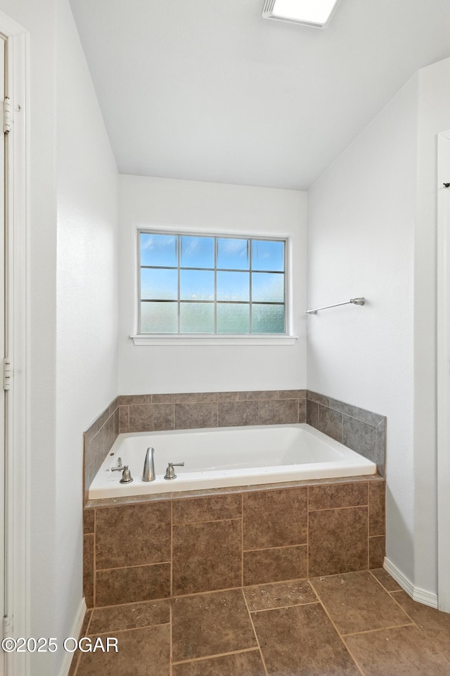 305 Anita Dr, Carl Junction, MO 64834 - full bath with healthy amount of natural light, a bath, and tile patterned flooring