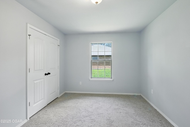 305 Anita Dr, Carl Junction, MO 64834 - unfurnished bedroom featuring carpet and baseboards