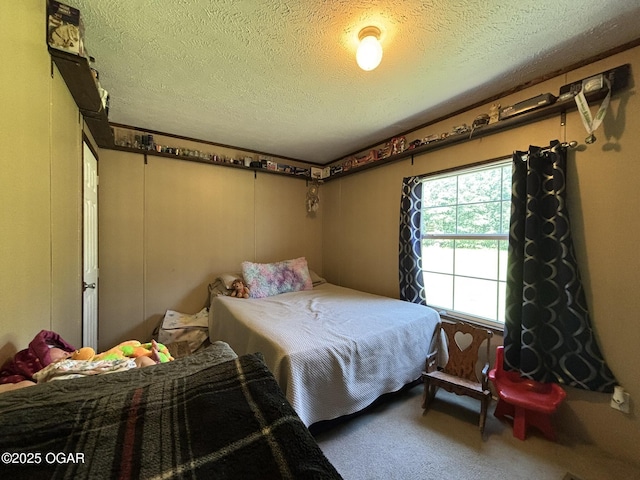 7575AND 7627 Amarillo Ln, Seneca, MO 64865 - bedroom featuring carpet floors and a textured ceiling