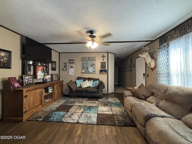 7575AND 7627 Amarillo Ln, Seneca, MO 64865 - living area featuring wood finished floors, ceiling fan, and a textured ceiling