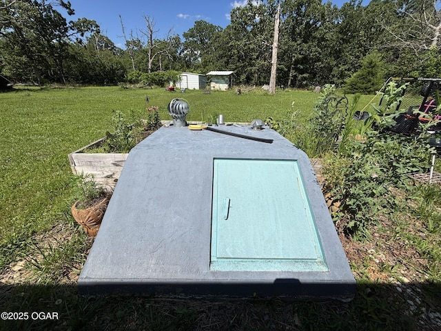 7575AND 7627 Amarillo Ln, Seneca, MO 64865 - view of storm shelter with a lawn