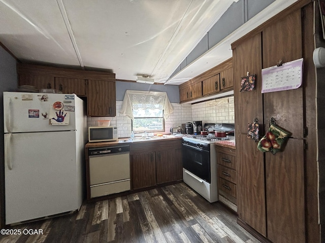 7575AND 7627 Amarillo Ln, Seneca, MO 64865 - kitchen with white appliances, dark wood finished floors, and backsplash