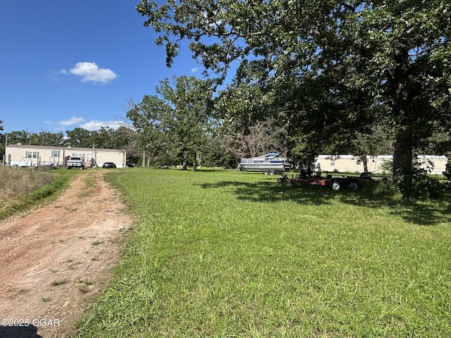 7575AND 7627 Amarillo Ln, Seneca, MO 64865 - view of yard with driveway