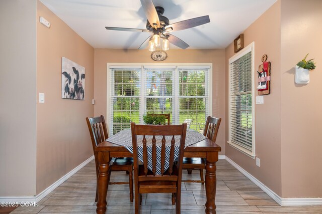 3101 Shore Dr, Grove, OK 74344 - dining room with a ceiling fan and light wood finished floors