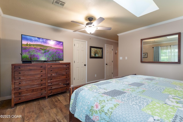 3101 Shore Dr, Grove, OK 74344 - bedroom with wood finished floors, crown molding, a skylight, and ceiling fan
