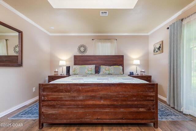 3101 Shore Dr, Grove, OK 74344 - bedroom featuring wood finished floors and ornamental molding