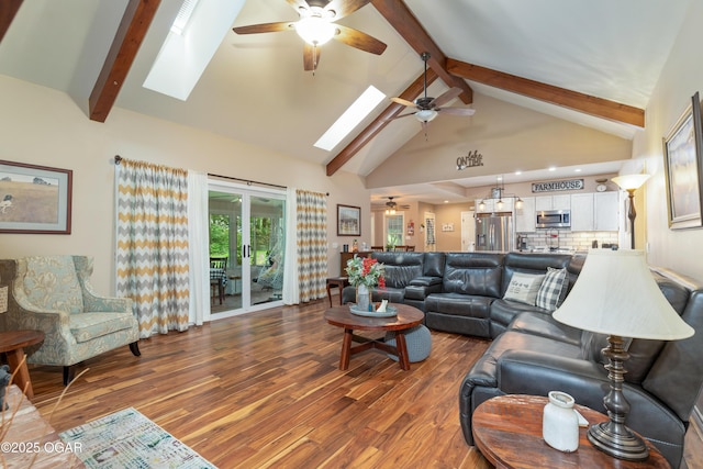 3101 Shore Dr, Grove, OK 74344 - living room featuring ceiling fan, a skylight, beamed ceiling, wood finished floors, and high vaulted ceiling