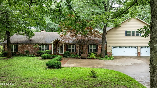 3101 Shore Dr, Grove, OK 74344 - view of front of property featuring an attached garage, a front lawn, driveway, and a chimney