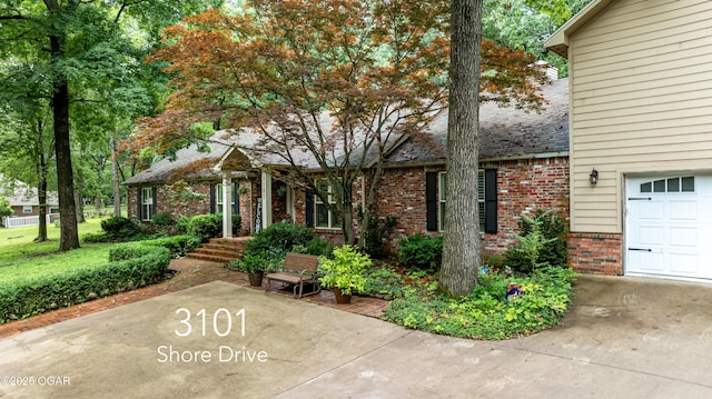 3101 Shore Dr, Grove, OK 74344 - view of patio / terrace with a garage