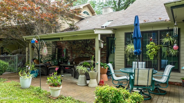 3101 Shore Dr, Grove, OK 74344 - wooden terrace featuring outdoor dining area and a patio