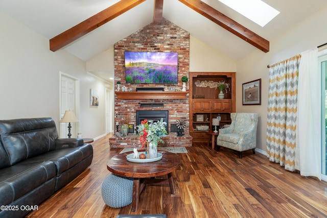 3101 Shore Dr, Grove, OK 74344 - living area featuring a skylight, beamed ceiling, wood finished floors, a brick fireplace, and high vaulted ceiling