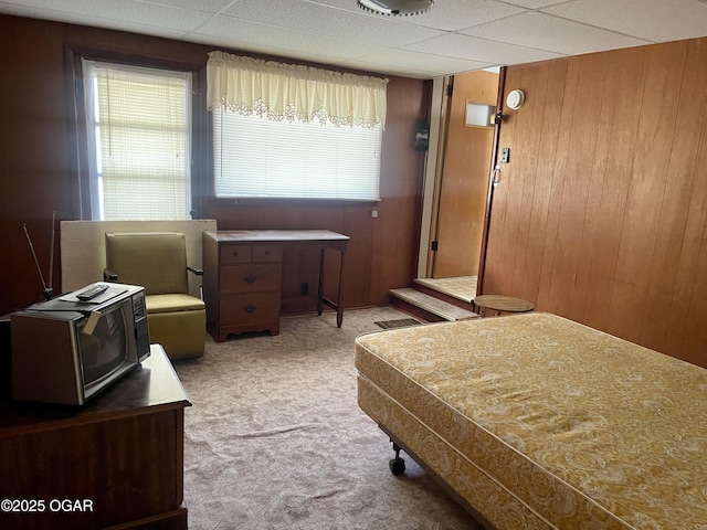 721 W Chestnut, Carthage, MO 64836 - bedroom featuring carpet floors and wood walls