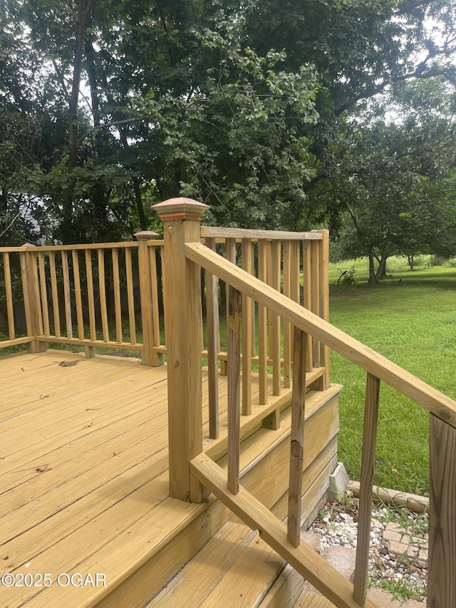 1701 S Kenser Rd, Joplin, MO 64801 - wooden deck featuring a lawn