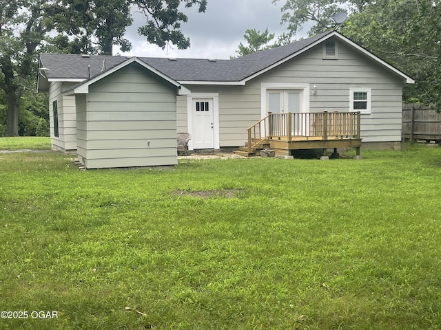 1701 S Kenser Rd, Joplin, MO 64801 - back of house with a shingled roof, french doors, and a wooden deck
