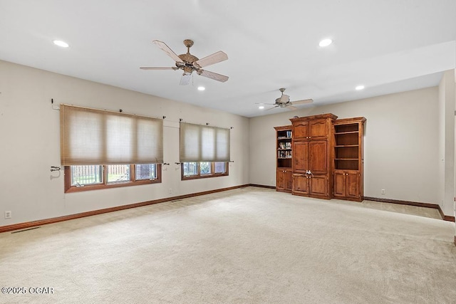 4345 Rob Ln, Joplin, MO 64804 - unfurnished living room featuring light colored carpet, recessed lighting, and a ceiling fan