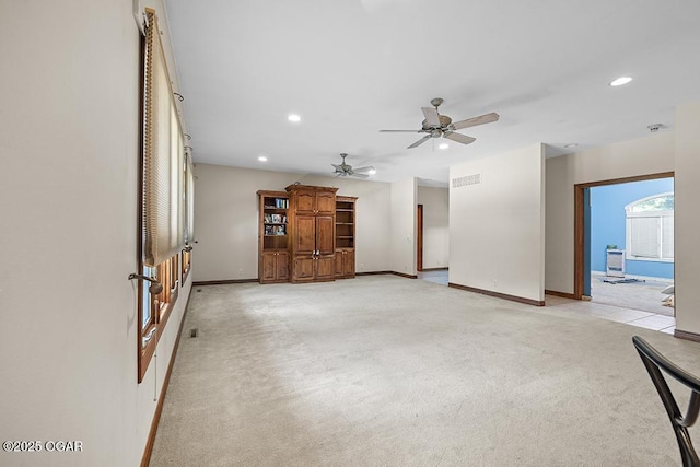 4345 Rob Ln, Joplin, MO 64804 - unfurnished living room with recessed lighting, light carpet, and ceiling fan