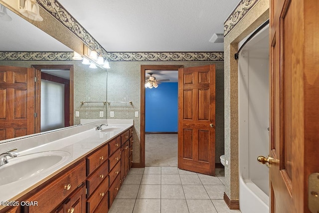 4345 Rob Ln, Joplin, MO 64804 - full bathroom featuring wallpapered walls, double vanity, tile patterned floors, and a ceiling fan