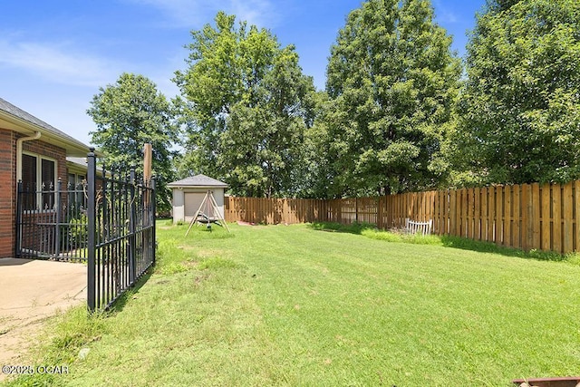 4345 Rob Ln, Joplin, MO 64804 - fenced backyard with an outdoor structure