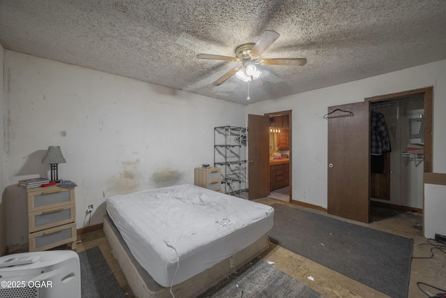1021 Glendale Rd, Joplin, MO 64804 - bedroom featuring a textured ceiling, ceiling fan, and ensuite bathroom