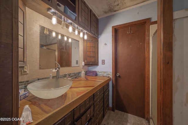 1021 Glendale Rd, Joplin, MO 64804 - bathroom with vanity, a shower stall, and ornamental molding