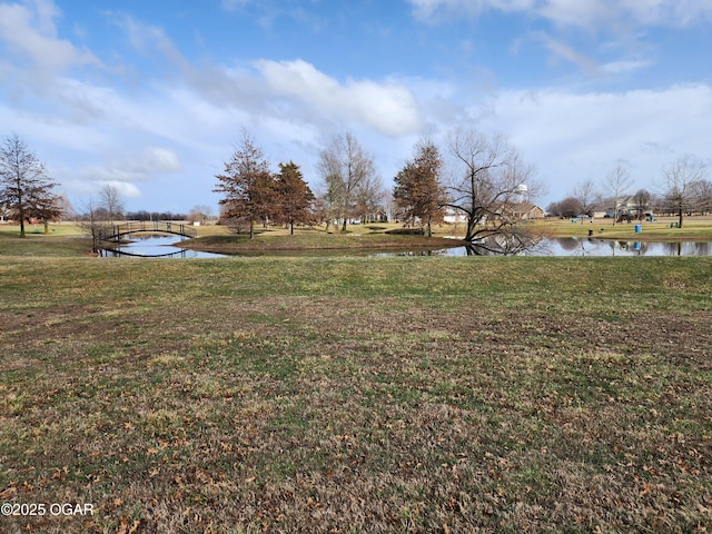 1502 E 7th St, Lamar, MO 64759 - view of grassy yard with a water view