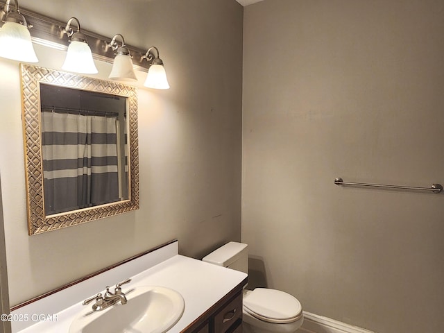 1502 E 7th St, Lamar, MO 64759 - bathroom with toilet and vanity
