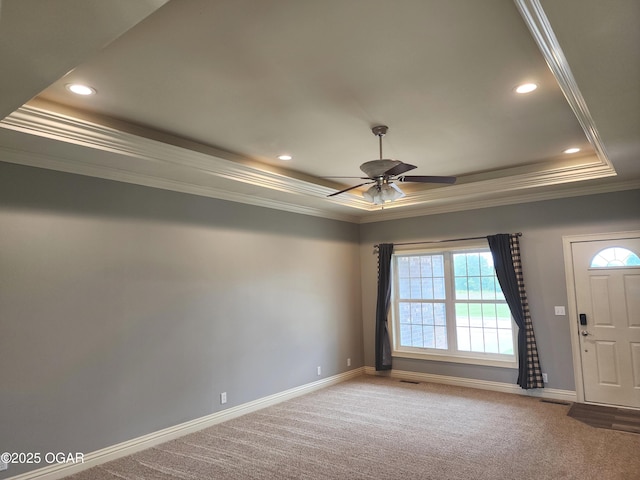1502 E 7th St, Lamar, MO 64759 - spare room featuring ornamental molding, a raised ceiling, carpet flooring, recessed lighting, and a ceiling fan