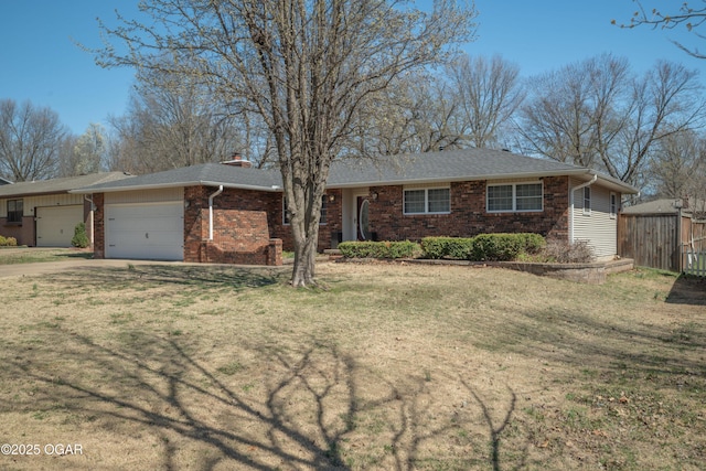 3701 College View Dr, Joplin, MO 64801 - ranch-style house featuring a garage, brick siding, a chimney, and driveway