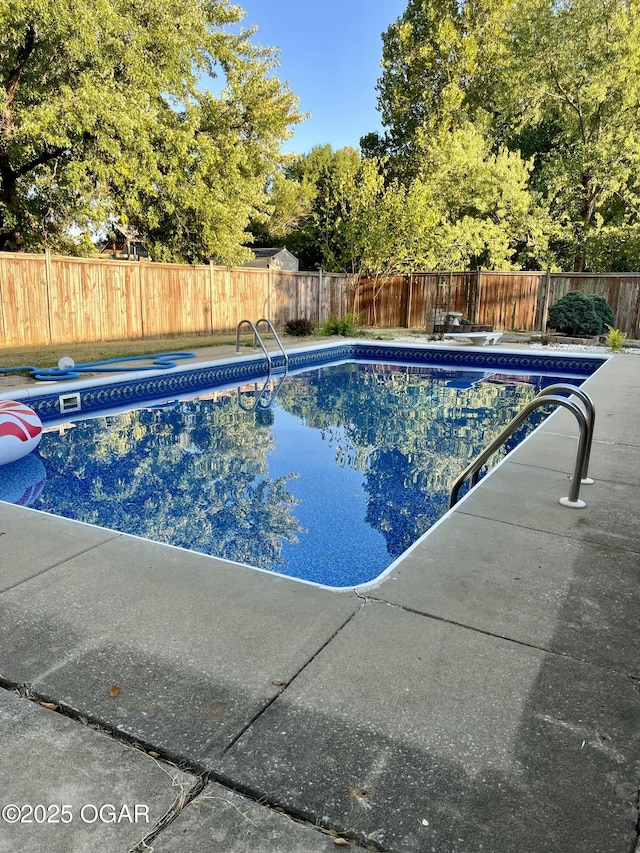 3701 College View Dr, Joplin, MO 64801 - view of pool featuring a fenced backyard, a patio area, and view of scattered trees