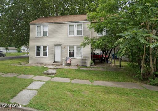 801 S Picher Ave, Joplin, MO 64801 - view of front of home featuring a front yard