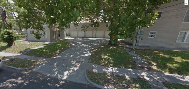 801 S Picher Ave, Joplin, MO 64801 - view of property exterior featuring driveway