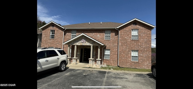 2962 Vineyards Pkwy Unit 1, Branson, MO 65616 - view of property with uncovered parking and brick siding