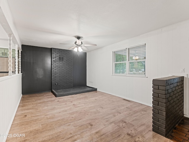 1619 W 2nd St, Joplin, MO 64801 - empty room with wood finished floors and ceiling fan