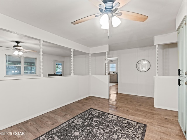 1619 W 2nd St, Joplin, MO 64801 - spare room with ceiling fan, healthy amount of natural light, and wood finished floors