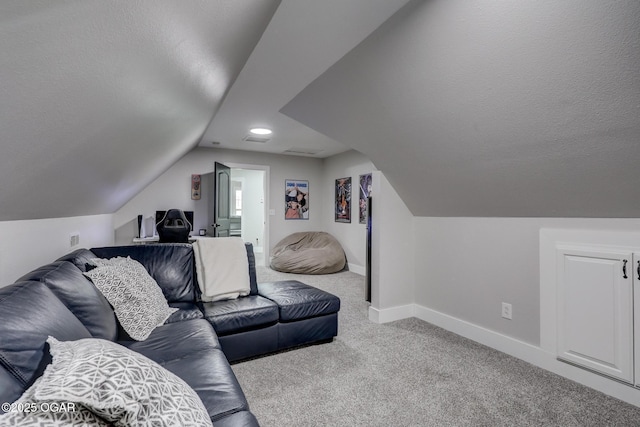 917 Monroe Cir, Carl Junction, MO 64834 - living area with carpet flooring, vaulted ceiling, and a textured ceiling