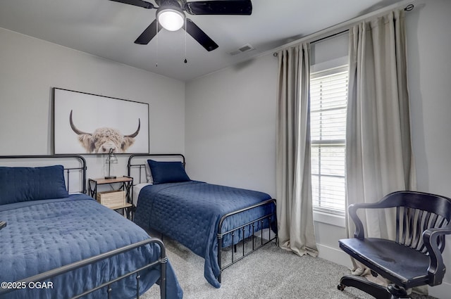 917 Monroe Cir, Carl Junction, MO 64834 - carpeted bedroom with multiple windows and a ceiling fan