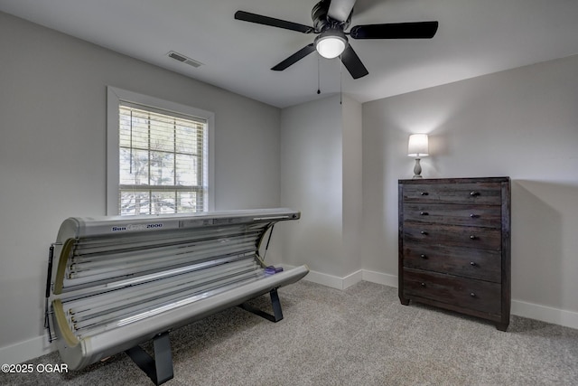 917 Monroe Cir, Carl Junction, MO 64834 - sitting room featuring ceiling fan, light colored carpet, and a tanning bed
