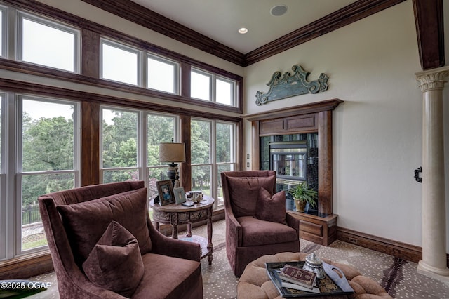 1126 Carrington Ter, Joplin, MO 64804 - living area with crown molding, a high ceiling, a high end fireplace, and ornate columns