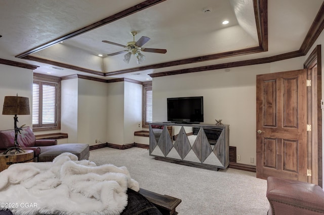 1126 Carrington Ter, Joplin, MO 64804 - living room featuring a raised ceiling, a ceiling fan, light carpet, crown molding, and recessed lighting