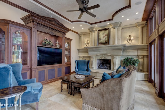 1126 Carrington Ter, Joplin, MO 64804 - living area featuring ornamental molding, ceiling fan, recessed lighting, a premium fireplace, and a raised ceiling